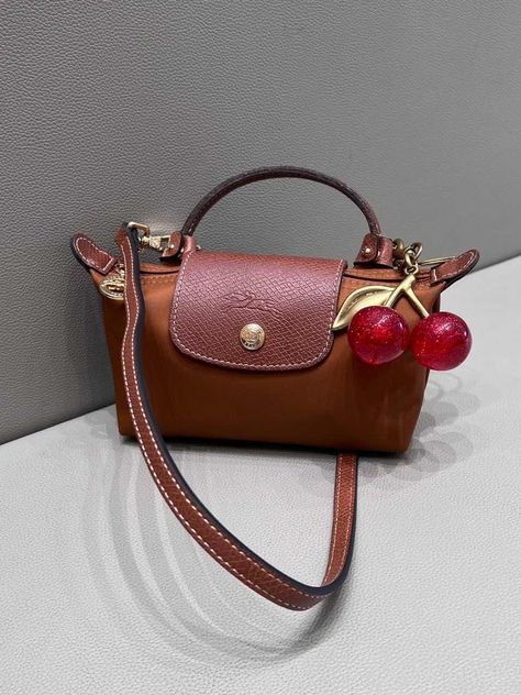 This cherry pendant is good -looking with my longchamp mini bag.Of course you can hang it on the key Mini Longchamp Bag, Longchamp Mini Bag, Charms For Bags, Cherry Pendant, Cherry Bag, Longchamp Mini, Pretty Tote Bags, Cherry Charm, Longchamp Bag