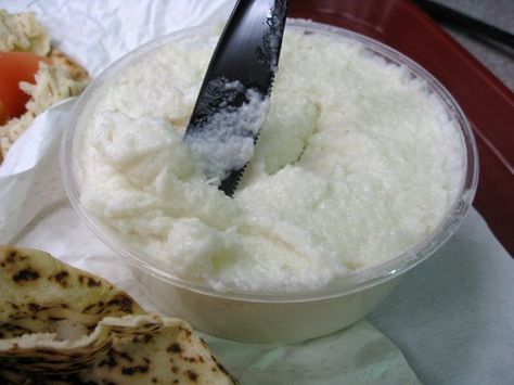 Zankou Chicken, the Armenian-Lebanese rotisserie chicken restaurant with a store in Anaheim's Little Arabia, is widely known for its white garlic sauce. At first glance, it looks like vanilla cake frosting. Taste it, though, and it has a garlic punch that whups you across the face like Randy Couture, as... Zankou Chicken, White Garlic Sauce, Chicken Restaurant, Garlic Spread, Chicken Garlic, Armenian Recipes, Lebanese Recipes, Middle Eastern Recipes, Garlic Sauce