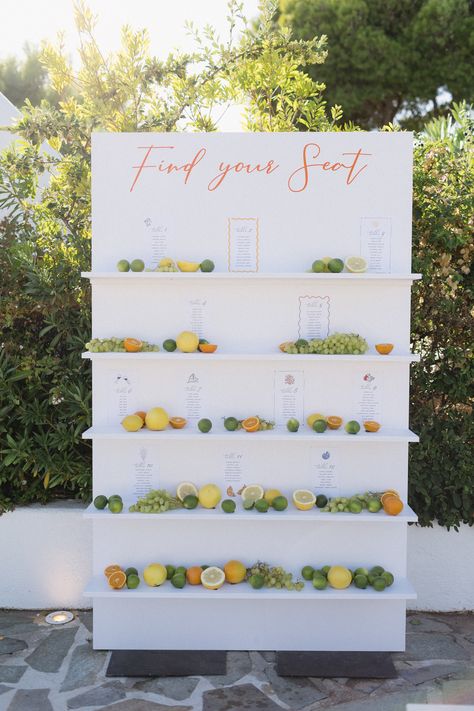 A Vibrant Wedding Table Seating Chart Aesthetic Wedding Seating Chart, Fruit Seating Chart, Food Seating Chart Wedding, Italian Seating Chart, Citrus Seating Chart, Lemon Seating Chart, Limoncello Seating Chart, Wedding Table Fruit, Orange Seating Chart