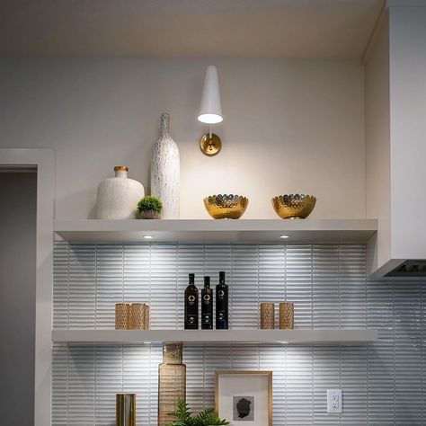 Matteo Lighting | Incorporating open shelves with the Blink wall sconce can create a sleek and stylish look in the kitchen. Open shelves provides a… | Instagram Lights Over Shelves, Open Shelving Lighting, Kitchen Open Shelves, Matteo Lighting, Lighting Photography, Minimalist Vibe, Kitchen Open, Open Shelves, Minimalist Aesthetic