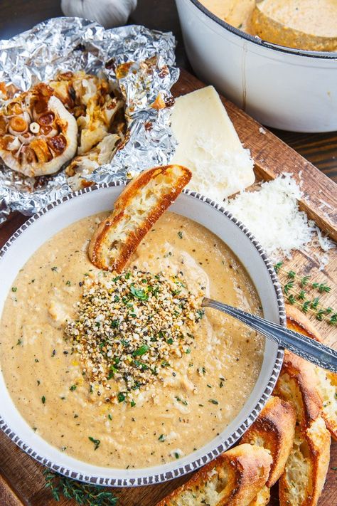 Asiago Roasted Garlic Cauliflower Soup Roasted Garlic Cauliflower Soup, Garlic Cauliflower Soup, Popped Quinoa, Cauliflower Soup Recipe, Fried Rice Dishes, Garlic Cauliflower, Toasted Quinoa, Cauliflower Soup Recipes, Roasted Garlic Cauliflower