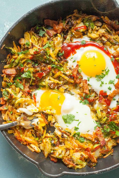 This simple Brussels Sprouts breakfast skillet has some amazing fall flavors and is my new favorite take on hash. I cook mine in a cast iron skillet with potatoes, bacon, and eggs! Dig in. | macheesmo.com #breakfast #skillet #easyrecipes #brusselssprouts Egg Breakfast Recipes Easy, Breakfast Skillet Recipes, Diet Salad Recipes, Fall Recipes Breakfast, Breakfast For A Crowd, Over Easy Eggs, Hash Recipe, Breakfast Skillet, Breakfast Hash