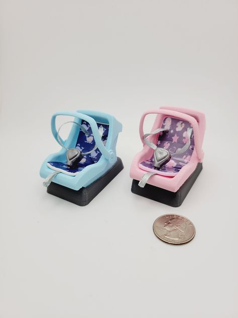 1:12 Scale Miniature Car Seat/Carrier with Base  This would make a great addition your dollhouse nursery, diorama, roombox, or use as a prop when creating scenes 2 Options Available  Blue Seat with Gray Base Pink Seat with Gray Base Measure your mini babies for fit!  These were made to fit 1.5 inch - 2.50 inch babies.  I have the straps fairly loose to allow a baby to be inserted. Carrier cannot be removed from Base Straps Are Not Adjustable  Handle is stationary.  Please do not try to adjust it.  Foam Seat is covered in laminated vinyl 3D printed with PLA Dimensions in Inches 1.50 W x 2.75 D x 2.35 H Doll is not included....for size reference only.  She measures 5.75 inches These are not a toy!  They are meant for display only. As with all my handmade items, please allow for slight differ Nursery Diorama, Baby Doll Car Seat, Baby Doll Furniture, Miniature Nursery, Dollhouse Nursery, Baby Doll Nursery, Miniature Stuff, Fake Baby, Mini Toys