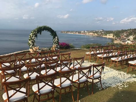 Natural Crossback Chairs for a Boho Chic Cliff Top Wedding Cliff Top Wedding, Wedding Organizer Planner, Crossback Chairs, Grass Wedding, Wedding Marketing, Wedding Vendor, Bali Wedding, Greece Wedding, Sophisticated Wedding