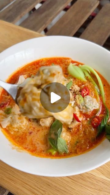 Nutrition Guide on Instagram: "RED CURRY WONTON SOUP 🥟🍜 @brendan_pang 

it’s a quick, easy, and delicious way to warm up your weeknight dinners.
 
- 24 x frozen wontons (or dumplings)
- A bunch of Asian greens
 
Red Curry Soup
- 1 tbsp vegetable oil
- 1 onion, finely chopped
- 1 thumb piece ginger, grated 
- 2 garlic cloves, minced
- 4 tbsp red curry paste (storebought)
- 4 cups chicken stock
- 1 can coconut milk
- 1 1/2 tbsp caster sugar (or to taste)
- 1 tbsp fish sauce (or to taste)
- Lime juice, to taste

Garnish
- Fresh herbs (spring onion, coriander or Thai basil)
- Long red chilli, sliced
- Fried shallots
 
To make the red curry soup, heat a vegetable oil in a large pot over medium heat. Add onion, ginger and garlic, and cook for 2 - 3 minutes, stirring until fragrant and soft. Ad Curry Wonton Soup, Curry Wonton, Frozen Wontons, Red Curry Soup, Thai Soup Recipes, Thai Curry Soup, Asian Greens, Homemade Chinese Food, Curry Soup