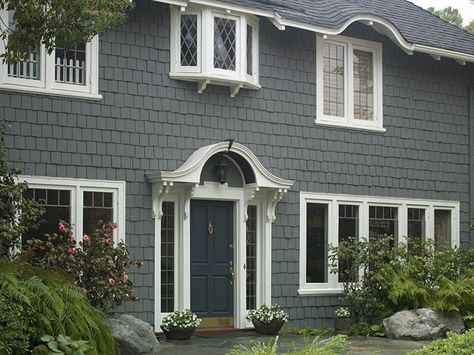 Want a fresh new look for the outside of your home? Get inspired by these eye-catching exterior paint color schemes from HGTV.com. Gray Home Exterior, Outside House Paint Colors, Modern Exterior Paint Colors, House Paint Design, Outside House Paint, Exterior Gray Paint, Turquoise Paint, Turquoise Door, Exterior Color Palette