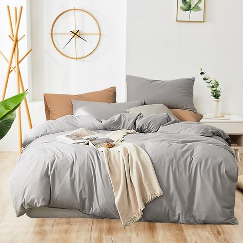 PRICES MAY VARY. 【HIGH QUALITY＆DURABLE CONSTRUCTION】 This silver grey comforter is filled with whole-piece superior microfiber, so this comforter is soft and durable. High quality fabric through unique printing and weaving technology makes this product resistant to fading, breathable and lightweight. 【3 Pcs Twin Comforter Sets】 1 x twin comforter (68" x 90'') and 2 x standard pillowcases (20" x 26"). 【ADD WARM TO YOUR HOME】 Available for all seasons.Pure grey quilt is soft and comfortable,bring Gray Bed Spread, Gray Comforter Bedroom, Grey Comforter Bedroom, Light Gray Bedding, Twin Men, Light Grey Bedding, Gray Bedding, Bedding Comforter Sets, Full Comforter Sets