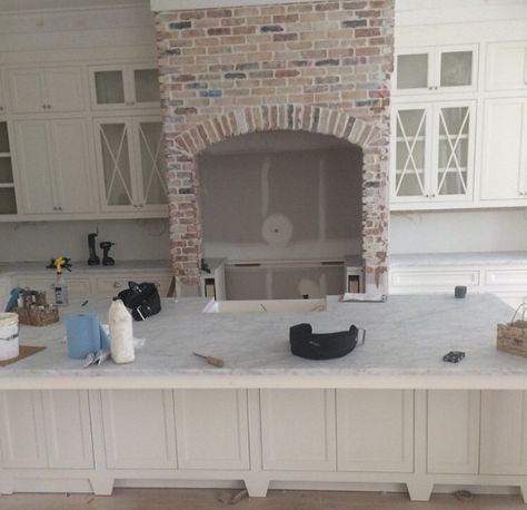 To die for brick fireplace Farmhouse Coastal Kitchen, Farmhouse Coastal Decor, Brick Farmhouse, Oven Hood, Farmhouse Living Room Furniture, Farmhouse Coastal, Instagram Kitchen, Diy Living Room Decor, Southern House Plans