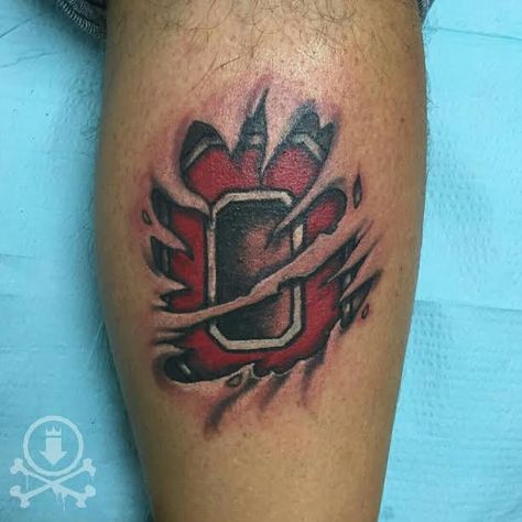 Brutal Ohio State skin rip tattoo by Jose Bolorin.  #12ozstudios #team12oz #tattoos #tattooartist #ohiostate #buckeyes #skinrip #tattoosformen Skin Rip Tattoo, Ohio State Tattoos, Ohio Tattoo, State Tattoos, Rip Tattoo, Aztec Tattoo Designs, Aztec Tattoo, Cool Chest Tattoos, Dad Tattoos