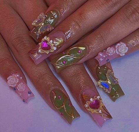 #acrylicnail #y2k #pearlescent #nailart #nailinspo #pink #fairy #barbie #cottagecore #bejewelled #naildesign #2000s #photography #handpose #aesthetic #charms #nailcharms #art #flora #fauna #coffin #square #thewinx #winxclub #fairycore #goldtouch #leafygreen #longnails #natural #fake #pose #fingers #rose Fairy Nails Coffin, Narnia Nails, Enchanted Nails Design, Fairy Nails Aesthetic, Fairy Nail Ideas, Spring Fairy Nails, Fairy Themed Nails Acrylic, Fairy Core Nails Acrylic, Barbie Cottagecore