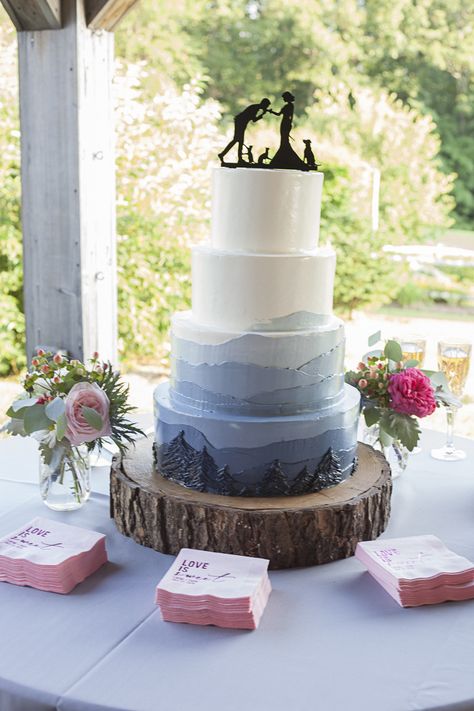 Mountain Cake Wedding, Alaska Themed Wedding, Woodsy Wedding Cake Ideas, Mountains Wedding Cake, Wedding Cake With Mountains, Nature Theme Wedding Cake, Pine Tree Wedding Cake, Wedding Decorations Mountain, Wedding Cake Mountain Theme