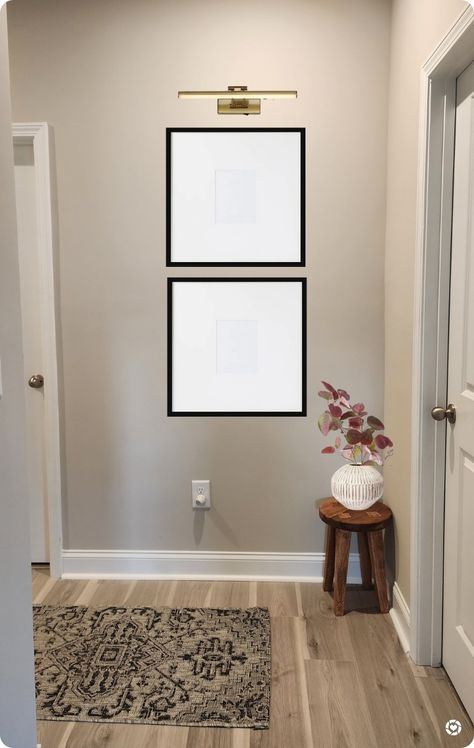 Pictures With Lights Above, Light Above Picture Frame, Wall Art Corner, Hallway Wall Sconces, Large Family Pictures, Entryway Inspo, Garage Entrance, Kitchen Cozy, 3 Picture Frame