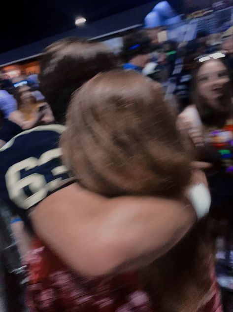 blurry picture of a football player hugging a girl Hs Football Aesthetic, College Football Couple Aesthetic, American Football Aesthetic Couple, Couple Playing Football Aesthetic, Wally Clark Aesthetic, Cheerleader Girlfriend Aesthetic, American Football Aesthetic High School, Football Bf Aesthetic, Rugby Girlfriend Aesthetic