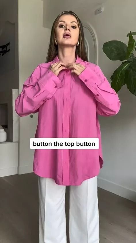 You've never seen a button down blouse styled like THIS. Learn an awesome way to style a button-down in this quick post. Pink And White Button Up Shirt Outfit, Oversized Satin Button Up Shirt Outfit, How To Style Oversized Button Down Shirt, Big Blouse Outfit, Ways To Style A Button Up Shirt, How To Style Oversized Button Up Shirts, Style Oversized Button Down, Pink Button Down Shirt Outfit, How To Wear Oversized Button Up Shirt