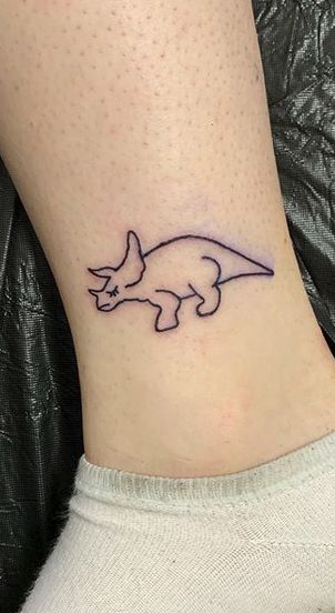 Tattoo Ideas Small Dinosaur, Small Tattoos Dinosaur, Dinosaur Tiny Tattoo, Delicate Dinosaur Tattoo, Tiny T-rex Tattoo, Tiny Dinosaur, Dinosaur Tattoos, Grey Tattoo, Minimal Tattoo