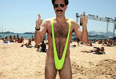 Bizarre Swimsuit Design For Men-crushable.com-OMG..... General Aladeen, Sacha Baron Cohen, Youth Club, Isla Fisher, Afro Wigs, Stag Party, Swimsuit Design, Middle Child, Green Swimsuit