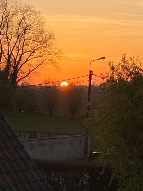 Sunset in a small town in Belgium Small Town Sunset, Laura Core, Small Town Mystery, Travel Belgium, Stop Light, Beautiful Lighting, Sunset Pictures, Beach Sunset, Small Town