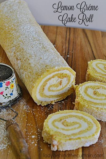 Lemon Créme Cake Roll | A light and fluffy sponge cake with a delicious easy to make lemon créme filling.  Your Holiday table, baby shower, birthday party Lemon Cake Roll Cream Cheeses, Lemon Cake Roll With Lemon Curd, Lemon Roll Cake Recipe, Lemon Cake Roll, Orange Roll Cake, Lemon Creme Cake, Lemon Roll, Fluffy Sponge Cake, Table Baby Shower