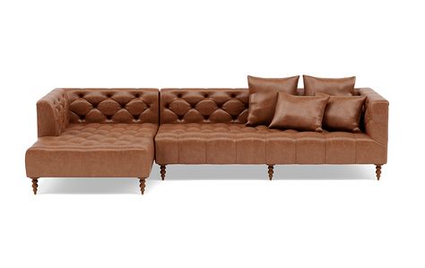 Ms. Chesterfield is our lighter, softer take on the classic Chesterfield sofa. We took the old-fashioned men's club design and gave it a more modern feel. The leather sectional sofa is a statement piece that can be customized to suit any room. We've kept the Chesterfield's signature tufting, but deconstructed its traditionally heavy shape. The back hits you at just the right height for maximum comfort, while the deep seat practically demands stretching out for a good nap. Both the seat and back Custom Sectional Sofa, Leather Sectional Sofa, Interior Define, Chesterfield Sofa, Leather Sectional, Living Room Sectional, Club Design, Apartment Therapy, Custom Leather