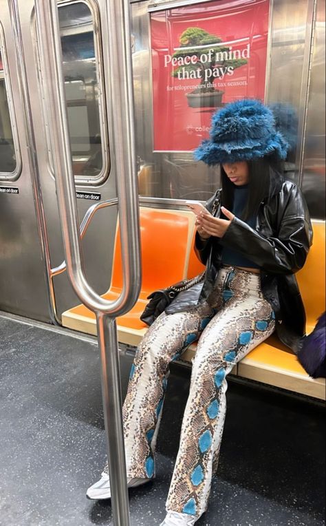 Blue And Black Outfit Black Women, Bucket Hat Concert Outfit, Fuzzy Hat Outfit Black Women, Fur Hat Outfit Black Women, Winter Aesthetic Black Woman, Outfits With Hats Black Women, Fly Outfits Women, Fuzzy Hat Outfit, Blue Outfit Black Women