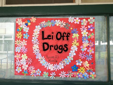 Beach Theme for the classroom. Red Ribbon Week: Lei Off Drugs. Students decorate flowers and glue them to the poster. Red Week, Cheer Posters, Red Ribbon Week, Elementary Counseling, School Displays, School Clubs, School Counseling, School Counselor, Beach Theme