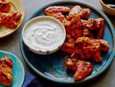 Chicken Wings with Red Hot Honey Glaze and Blue Cheese-Celery Dipping Sauce Recipe | Bobby Flay | Food Network Super Bowl Wings Recipe, Super Bowl Wings, Chicken Wing Flavors, Chinese Chicken Wings, Wings Recipes, Bobby Flay Recipes, Crispy Chicken Wings, Dipping Sauces Recipes, Hot Honey