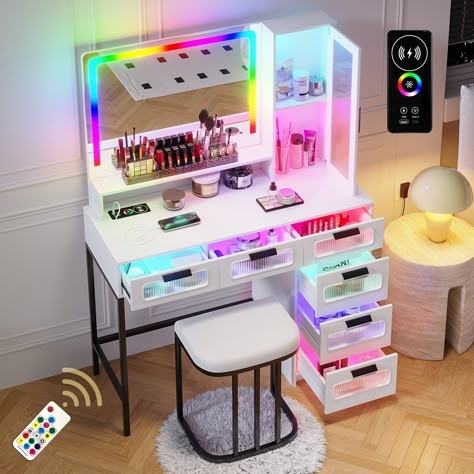 PRICES MAY VARY. 🍬【Vanity with Charging Station】This dresser desktop is equipped with a USB+Type-C+ wireless charging station. It provides a variety of charging modes to meet your charging needs for different electronic products. 🍬【Human Body Sensing Function】 This dressing table is equipped with a human body sensing function switch. When you turn on the human body function, it will automatically light up when you approach it and turn off automatically when you leave. 🍬【Colorful Lights】This v Bedroom Decor Organization, Desk For Bedroom, Teen Room Designs, Table With Shelves, Rgb Lights, Mirrored Vanity Desk, Vanity Table Set, Makeup Desk, Purple Rooms