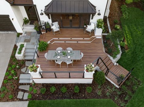 Project Spotlight: Tudor Revival Tudor Backyard, Bluestone Steps, Azek Decking, Luxury Landscape, Tudor Home, Tiered Deck, Lake Minnetonka, Privacy Plants, Luxury Landscaping