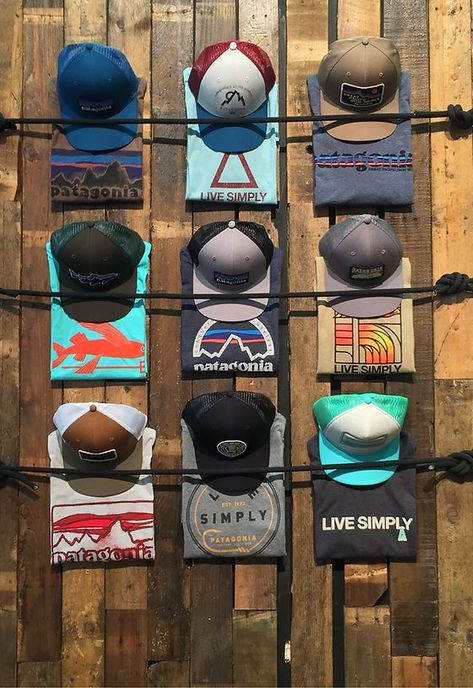 Cap Display Ideas Retail, Merchandise Ideas Clothing Retail, Outdoor Store Display, Camping Store Display, Apparel Display Ideas, Outdoor Retail Store Design, Retail Window Design, Mens Boutique Interior Design, T Shirt Display Ideas Retail