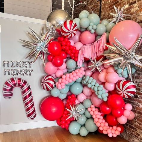 Holiday Event Ideas for Boutiques in 2023 - The Boutique Hub Colorful Christmas Balloon Garland, Pink Christmas Balloons, Christmas Balloon Wreath, Christmas Balloon Display, Pink Christmas Balloon Garland, Holiday Event Ideas, Christmas Balloon Wall, Christmas Balloon Backdrop, Christmas Balloon Arch