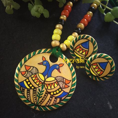 Hand crafted and hand painted Madhubani pendant set Madhubani Jewellery Design, Jewellery Painting, Painted Jewellery, Painted Necklace, Diy Jewelry Set, Fabric Doll House, Earrings Diy Handmade, Basic Hand Embroidery Stitches, Hand Painted Pendant