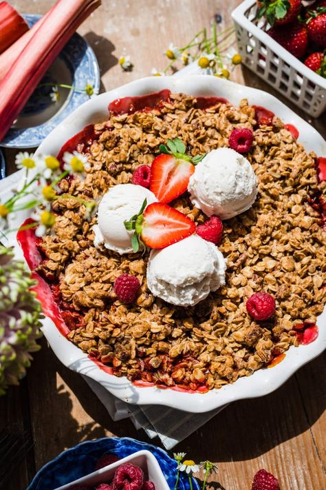 We love this vegan and gluten free Strawberry Rhubarb Crisp for a delicious and easy spring or summer dessert! It has a tart, sweet, jammy filling and a buttery oat topping that the whole family will love. Don't forget to serve with a scoop of vanilla ice cream! Blueberry Rhubarb Crisp, Vegan Meringue, Raspberry Oatmeal, Tree Nut Allergy, Vanilla Cream Cheese Frosting, Raspberry Rhubarb, Strawberry Rhubarb Crisp, Rhubarb Desserts, Rhubarb Crisp