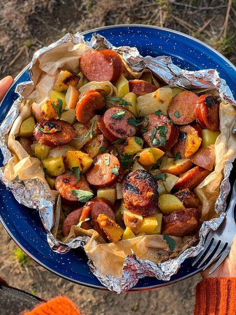 Grilled kielbasa, potatoes, and onions all tossed together in a honey mustard sauce and grilled to perfection. This foil packet recipe is such a satisfying camping meal and it is an absolute cinch to make! Foil Recipes, Grilled Kielbasa, Foil Meals, Kielbasa And Potatoes, Foil Packet Potatoes, Cowboy Casserole, Cajun Sausage, Foil Dinners, Foil Packs