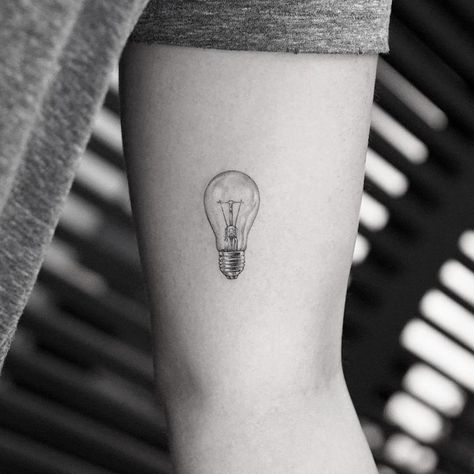 https://www.buzzfeed.com/adrianleandro/delicate-tattoos-2018?utm_term=.ep7BvOVk2#.akEJ1zEem Light Bulb Tattoo, Bulb Tattoo, Lightbulb Tattoo, Minimalist Tattoo Meaning, Lamp Tattoo, Typography Tattoo, Light Tattoo, Muster Tattoos, Jesus Tattoo