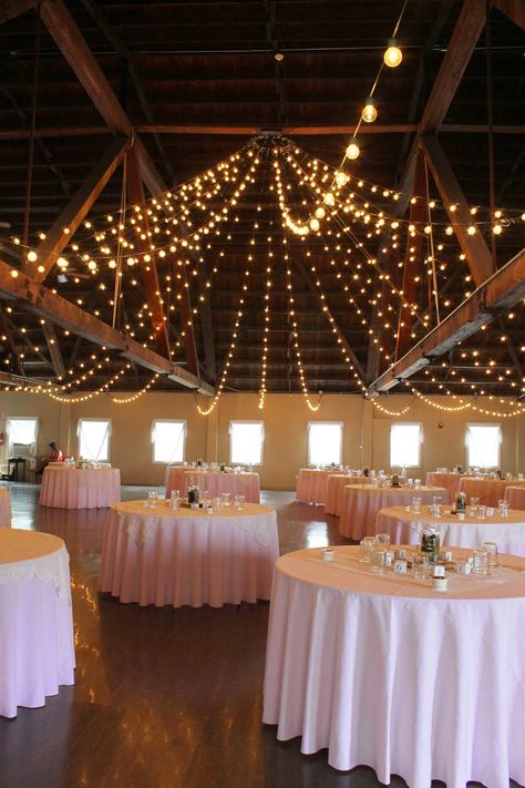 Green Villa barn wedding blush and lace and twinkle lights Lighted Ceiling Ideas For Weddings, Indoor Fairy Lights Ceiling, String Lights From Ceiling Wedding, Hanging Lights At Wedding, Wedding String Lights Indoor, Twinkle Lights Ceiling, Party Lighting Indoor, Ceiling Twinkle Lights, Twinkle Lights Party