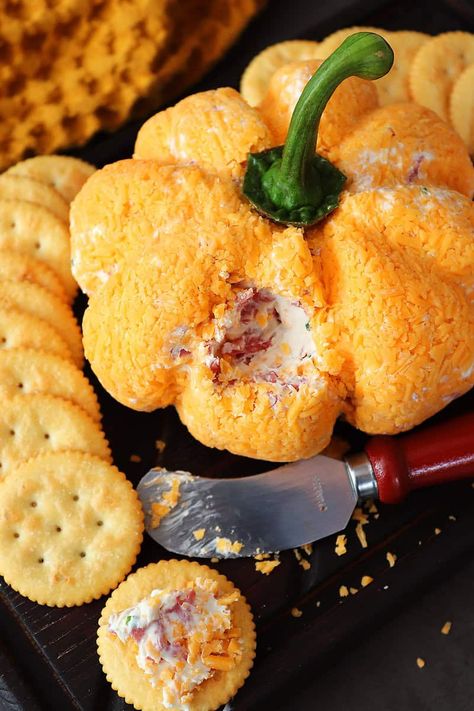 Indulge in a festive fall twist on the classic cheese ball with our delightful chipped beef pumpkin cheese ball. Crafted with savory chipped beef and creamy cheeses, shaped into a charming pumpkin for the fall season, Halloween, or Thanksgiving. Halloween Chip Dip Ideas, Cheese Balls Halloween, Fall Cheeseball Recipes, Halloween Cheeseball Ideas, Pumpkin Shaped Cheeseball, Pumpkin Cheeseball, Chipped Beef Cheese Ball, Pumpkin Cheese Ball Recipe, Beef Cheese Ball