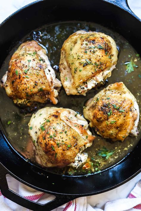 Stuffed Chicken Thighs with Spinach and Goat Cheese is the best 30-minute, cast iron chicken recipe thanks to it's cheesy center and crispy skin | foodiecrush.com #chicken #dinner #recipe #foodblogger #spinach #cheese Cast Iron Chicken Recipes, Stuffed Chicken Thighs, Lemon Ginger Chicken, Spinach And Goat Cheese, Baked Stuffed Chicken, Lemon Chicken Thighs, Braised Kale, Spinach Cheese, Wilted Spinach