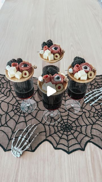 Jen Alvarez • Home Decor on Instagram: "Halloween charcuterie wine glass toppers 🍷👻 comment “wine topper” & I’ll send over everything I used here 🤍  Elevate your Halloween gatherings with these spooky charcuterie wine glass toppers! 🎃🧀 Perfect for adding a festive touch to your wine night. Sip, snack, and scare🍷   Shop this post on my LTK - in bio   #HalloweenCharcuterie #SpookySeason #PartyIdeas  #HalloweenParty #entertainingathome #partyideas #halloween #halloweenideas #ltkhome" Charcuterie Cups Halloween, Wine Glass Charcuterie Board, Halloween Charcuterie Cups, Spooky Charcuterie, Sip And Shop, Halloween Charcuterie, Halloween Wine, Wine Night, Charcuterie Board