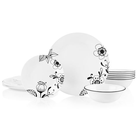 A modern pattern with a hint of floral tradition, this dramatic design is a bold statement for your table. Pyrex Glass Storage, Corelle Dinnerware Set, Corelle Plates, Corelle Patterns, Corelle Dinnerware, White Dinnerware Set, Glass Dinnerware, Stoneware Dinnerware Sets, Patterned Plates