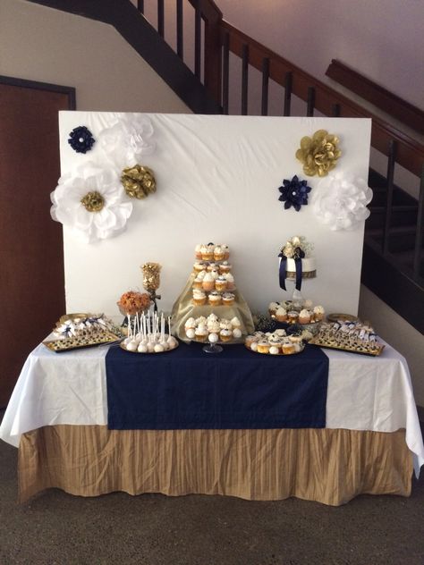 Dessert table done in Navy and gold. Navy And Gold Dessert Table, Gold Dessert Table Ideas, Navy Dessert Table, Grad Table, Gold Dessert Table, Dessert Table Ideas, Buffet Set Up, Gold Dessert, Baby Shower Dessert Table