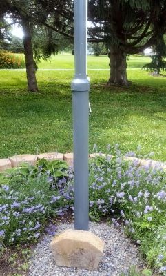 DIY Flag Pole- Mr. McGee Takes Over the Blog - My Mobile Home Makeover Landscape Around Flag Pole Yard Ideas, Flag Pole Ideas Diy, Pvc Flag Pole, Diy Flag Pole, Flag Pole Landscaping, Starter Garden, Diy Flag, Flag Pole Holder, Mobile Home Makeover