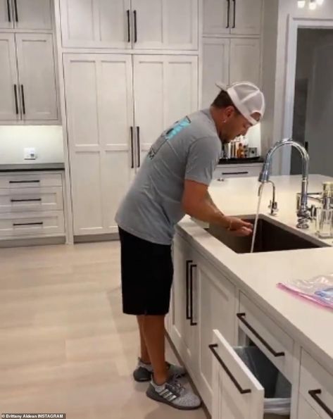 Brittany and Jason Aldean show off their new Tennessee mansion Brittany Aldean, Classy Kitchen, White Slides, Country Singer, Man Room, Jason Aldean, Power Couple, Wood Beams, Country Singers