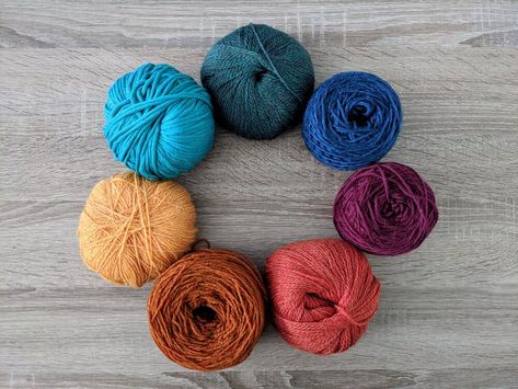 Yarn in jewel tones Jewel Tone Crochet, Type Of Stitches, Jewel Tone Color Palette, Earth Tone Palette, Earth Tone Color Palette, Earth Tone Color, Jewel Tone Colors, Types Of Stitches, Earth Tone Colors