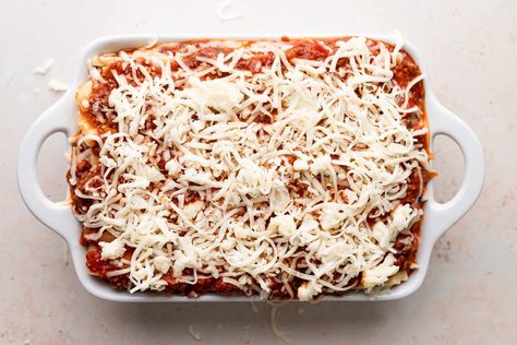 A lasagna in the freezer is like money in the bank. Here’s the lowdown on whether you should freeze before or after baking, how to bake casseroles right from the freezer, and a smart tip to free up your pans. How To Freeze Lasagna, Freeze Lasagna, Casserole To Freeze, Frozen Lasagna, Ziti Recipes, Favorite Casseroles, Special Occasion Food, Homemade Lasagna, Pasta Casserole