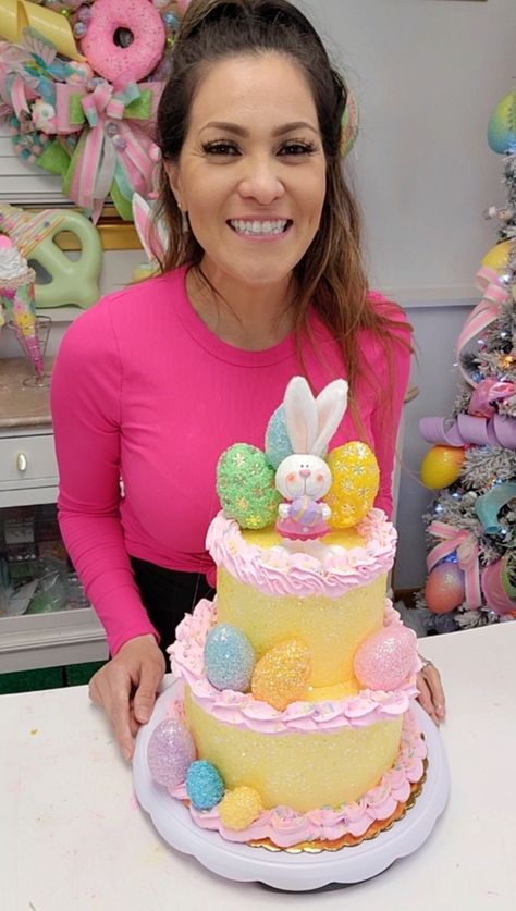 Let me show you how to create an extremely easy and fast Fake Whimsical Easter Cake for your Spring decor! | Let me show you how to create an extremely easy and fast Fake Whimsical Easter Cake for your Spring decor! Supplies ~8x4 & 6x4 Cake Dummy ~Lightweight... | By Glittz and Glue | Facebook | Hey guys grab your Spackle and come join me in today's quick tutorial I'm going to show you how to make the easiest and prettiest Easter fake cake you don't need a lot of supplies so you probably have Fake Easter Cake, Easter Cake Designs, Cake Dummy, Bake Ideas, Three Tier Tray, Fake Cakes, Cupcake Decorating Tips, Fake Bakes, Tier Trays