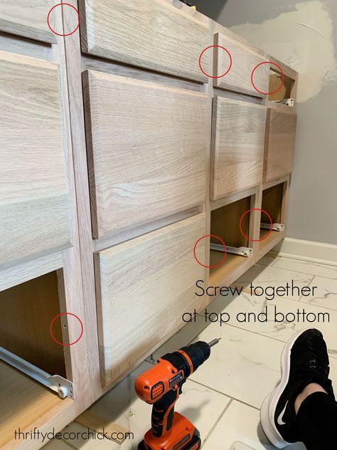 How to Create Custom DIY Built Ins With Stock Cabinets | Thrifty Decor Chick | Thrifty DIY, Decor and Organizing Built Ins With Stock Cabinets, Diy Built In Storage, Cabinets For Laundry, Diy Built Ins, Unfinished Kitchen Cabinets, Unfinished Cabinets, Stock Kitchen Cabinets, Built In Entertainment Center, Office Built Ins