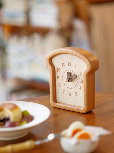 Infuse your home with creativity and humor with our whimsical toast bread silent desk clock. This innovative clock resembles a slice of toast bread, combining practical functionality with a playful design for a delightful home décor accent.Playful Design: Resembles a slice of toast bread, adding a cheerful and unique twist to traditional clocks. Material:woodenS Size:14.3cm(L)*15.5cm(H)L Size:20.5cm(L)*22.3cm(H) (1 inch=2.54cm) Creative Clock Design, Cute Home Items, Food Shaped Decor, Playful Office, Crockery Design, Desk Items, Cute Desk Accessories, Toast Bread, Desktop Clock