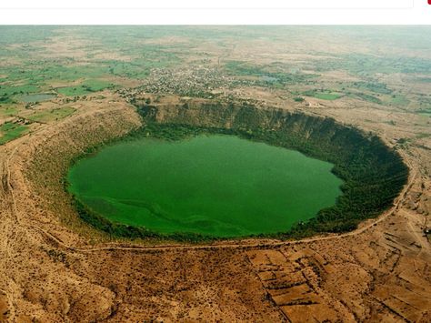 Lonar Crater Lake was formed around 570,000 yrs ago from a meteor impact. It is categorized as a saline soda lake, because of a high concentration of carbonate salts. Buldana district in Maharashtra Lonar Lake, Meteor Impact, Mohenjo Daro, Impact Crater, Kovalam, Mysterious Places, Crater Lake, Samos, Nagasaki