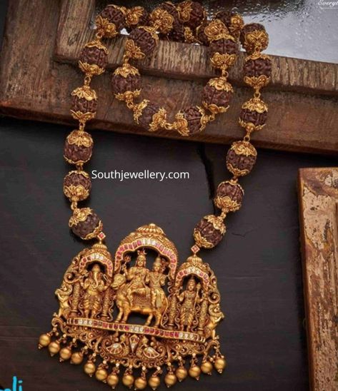 Rudraksh beads mala with Shiva Parvathy pendant photo Rudraksha Jewelry, Ganesh Pendant, Temple Jewelry Necklace, Gold Temple Jewellery, Jewellery Bridal, Beads Mala, Antique Jewellery Designs, Jewellery Wedding, Beautiful Gold Necklaces