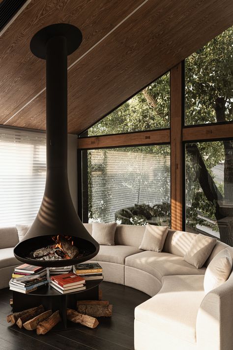 Circular Fireplace Indoor, Indoor Outdoor Fireplace Wood Burning, Wood Aroubd Fireplace, Minimal Villa, Firewood Storage Outdoor, Australia House, Barn Conversion, Modern Fireplace, Forest House